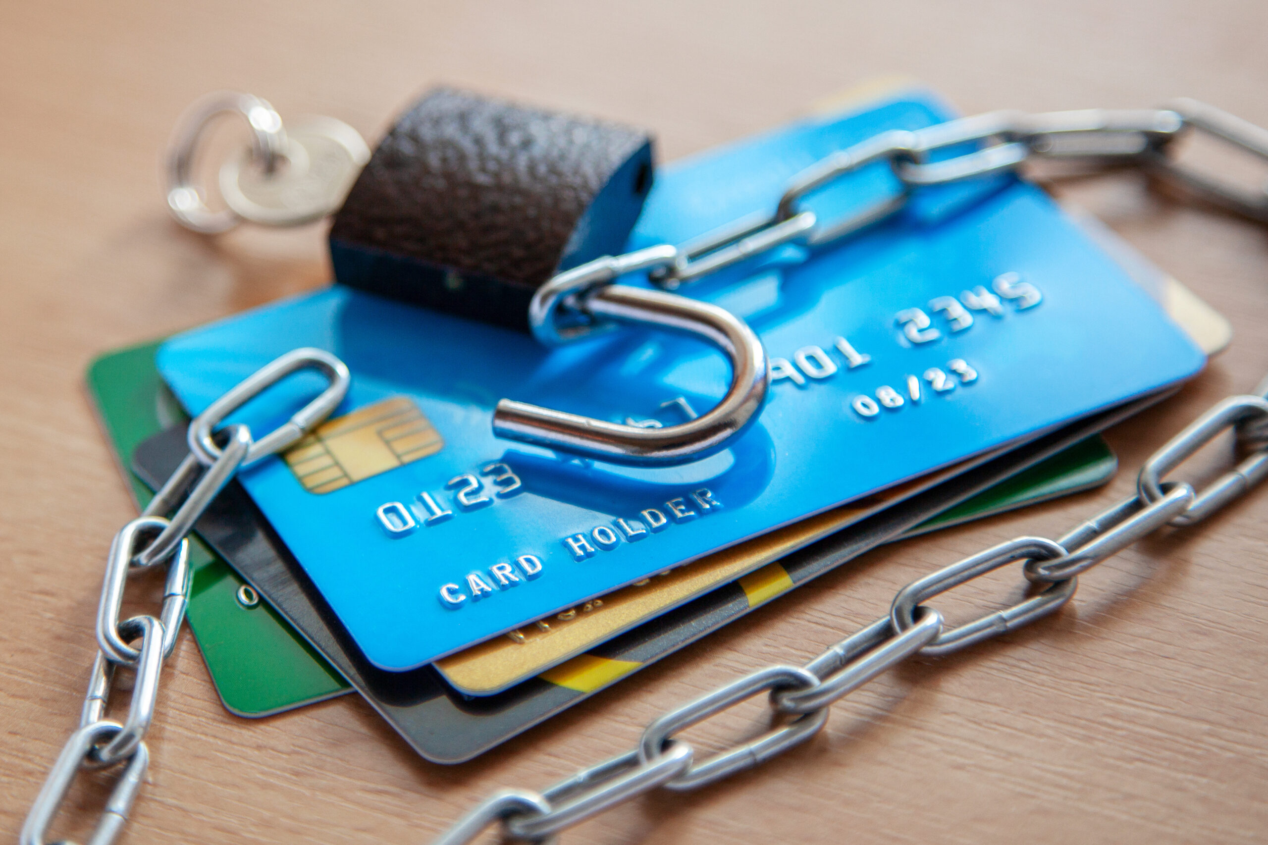 Credit cards with an open lock and chain. Open access to the use of electronic money FinTech